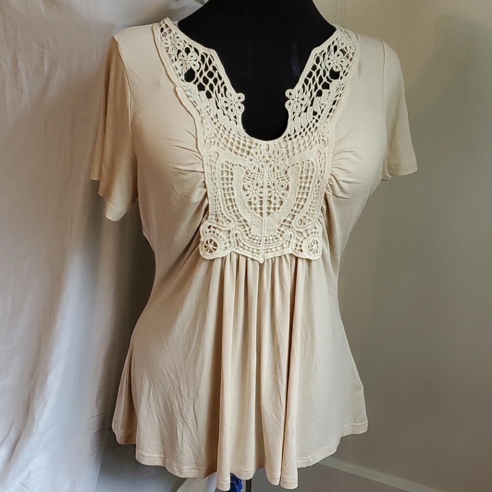 Flattering top with crochet lace detail